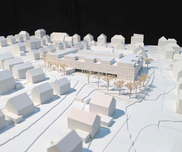 Modell von Variante 2: So könnte die Gestalt des Lidls mit Wohnungen auf dem Dach am Ende aussehen. Simulation: Freivogel+Mayer