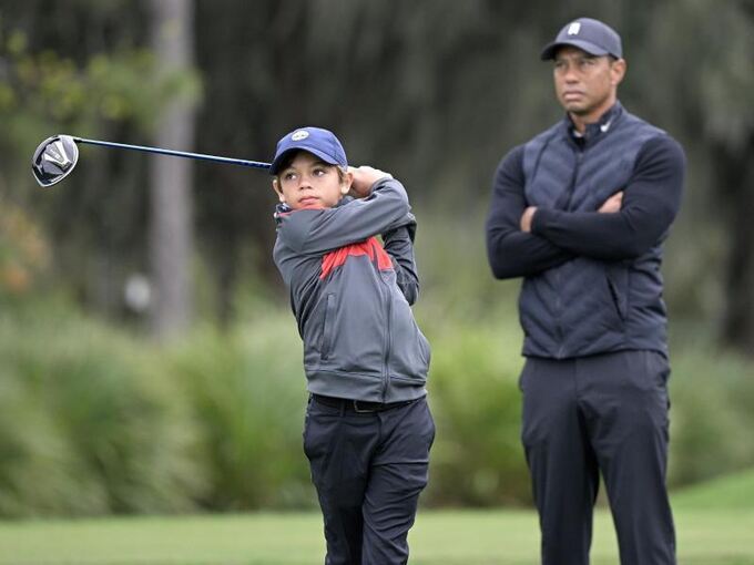 Charlie und Tiger Woods