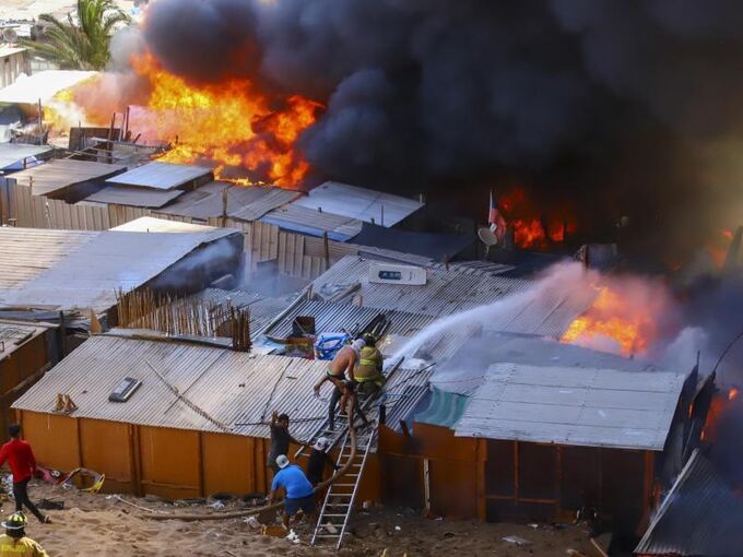 Feuer in Migrantensiedlung in Chile