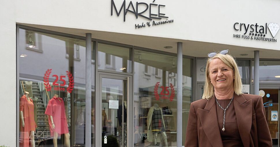 Mode ist ihr Geschäft: Marija Krehl vor ihrem Laden. Foto: Andreas Becker