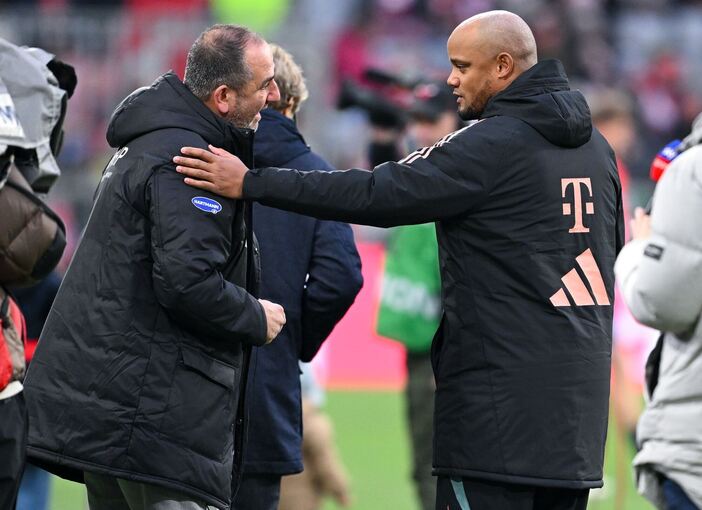 Frank Schmidt (l) und Vincent Kompany