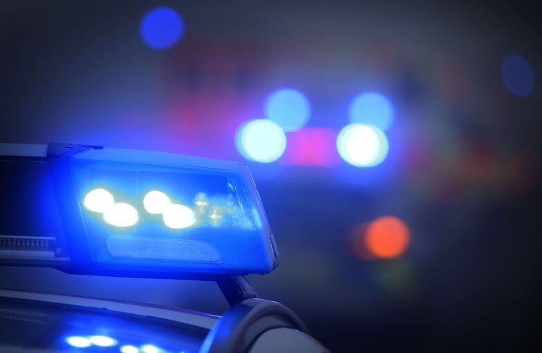 Polizeiauto mit Blaulicht Polizeiauto mit Blaulicht
